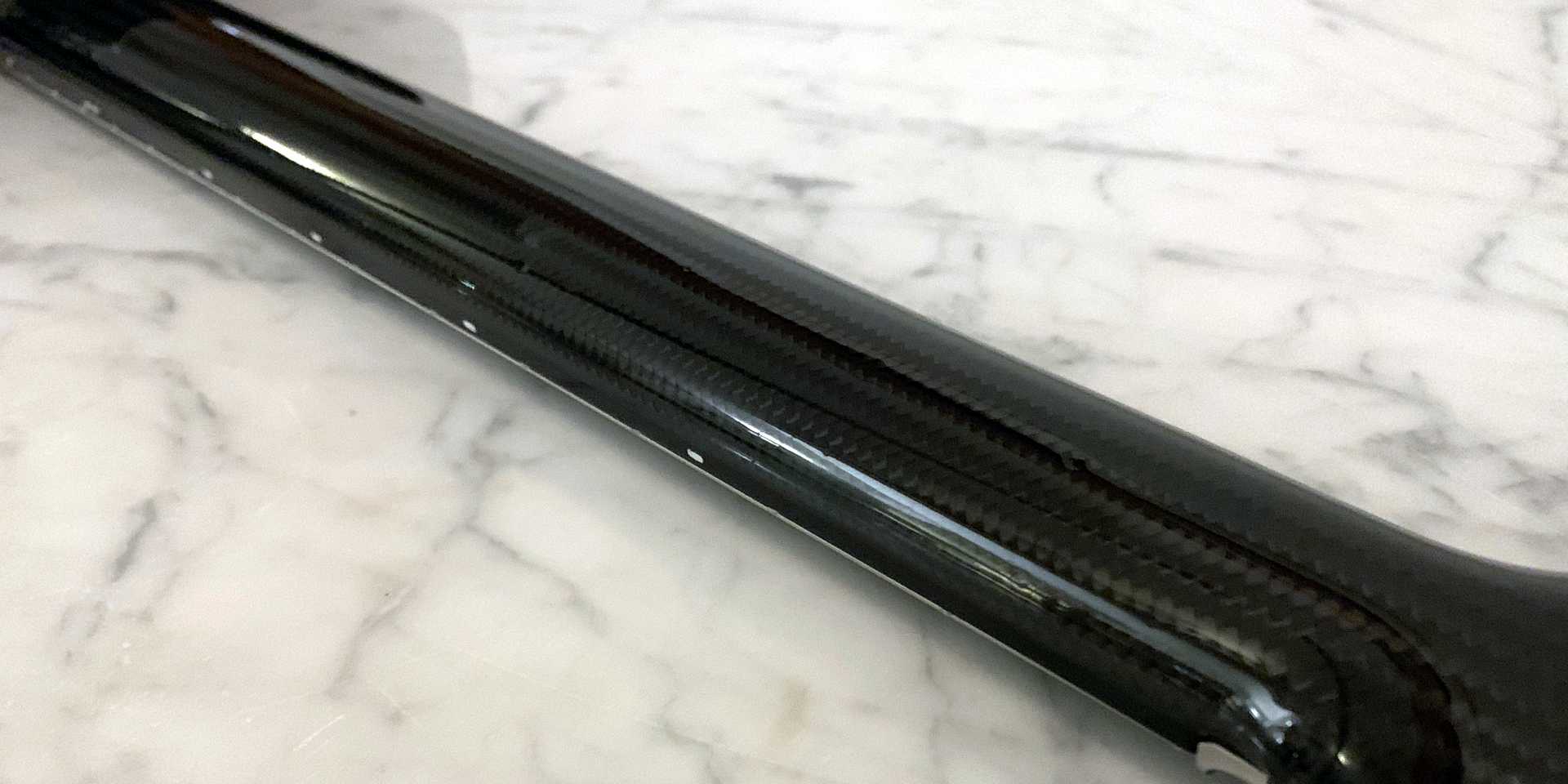 Carbon fibre guitar neck finish